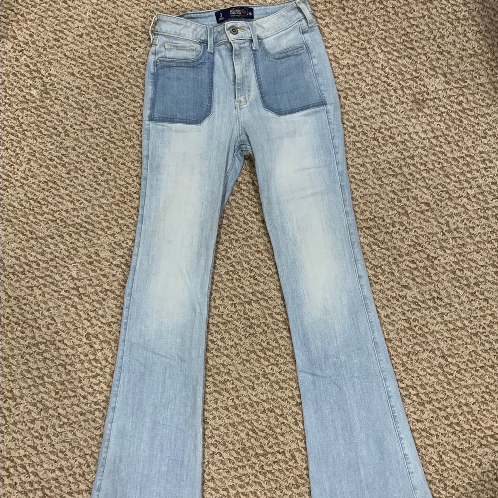 High rise flare jeans with accent pockets